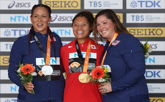 (230826) -- BUDAPEST, Aug. 26, 2023 -- Gold medalist Camryn Rogers (C) of Canada poses with silver medalist Janee Kassanavoid (L) of the United States and bronze medalist DeAnna Price of the United States during the awarding ceremony for the women s hammer throw final during the World Athletics Championships in Budapest, Hungary, Aug. 25, 2023. ) (SP)HUNGARY-BUDAPEST-ATHLETICS-WORLD CHAMPIONSHIPS-DAY 7 LixYing 
