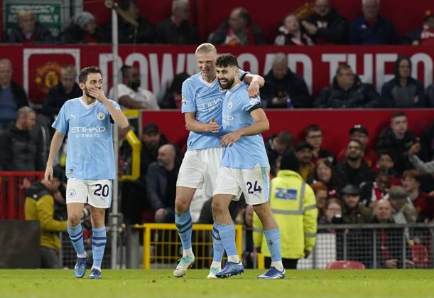 Manchester, England, 29th October 2023. Erling Haaland of Manchester City (c) celebrates scoring their second goal during the Premier League match at Old Trafford, Manchester. Picture credit should read: Andrew Yates Sportimage EDITORIAL USE ONLY. No use with unauthorised audio, video, data, fixture lists, club league logos or live services. Online in-match use limited to 120 images, no video emulation. No use in betting, games or single club league player publications. SPI-2690-0048