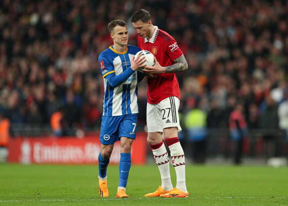 Brighton and Hove Albion v Manchester United, ManU - The FA Cup - Semi-Final - Wembley Stadium April 23, 2023, London: London, England, 23rd April 2023. Wout Weghorst of Manchester United (right) gives the ball to Solly March of Brighton and Hove Albion (left) before his missed penalty in the shootout during the The FA Cup match at Wembley Stadium, London. London EDITORIAL USE ONLY Copyright: xx ZUMA-20230423_zaf_si1_073.jpg KieranxCleevesx csmphotothree088529