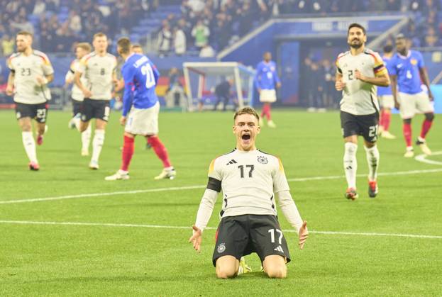 Bilder des Jahres 2024, Sport 03 März Sport Themen der Woche KW12 Sport Bilder des Tages Florian Wirtz, Nr. 17 DFB scores, shoots goal , Tor, Treffer, Torschuss, 1-0, celebrates his goal, happy, laugh, celebration, in the friendly match FRANCE - GERMANY FRANKREICH - DEUTSCHLAND in preparation for European Championships 2024 on Mar 23, 2024 in Lyon, France.