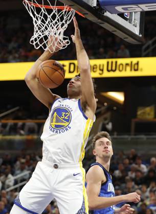 March 27, 2024, Orlando, FL - Florida, USA: The Golden State Warriors Trayce Jackson-Davis (23) dunks over the Orlando Magic s Franz Wagner at the Kia Center on Wednesday, March 27, 2024, in Orlando, Florida. Orlando USA - ZUMAm67_ 0442592972st Copyright: xStephenxM.xDowellx