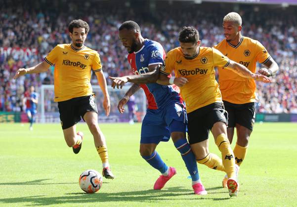 Crystal Palace v Wolverhampton Wanderers - Premier League - Selhurst Park September 3, 2023, London: London, England, 3rd September 2023. Jordan Ayew of Crystal Palace is challenged by Pedro Neto of Wolverhampton Wanderers during the Premier League match at Selhurst Park, London. (Credit Image:  Paul Terry Sportimage Cal Media) London EDITORIAL USE ONLY Copyright: xx ZUMA-20230903_faf_si1_074.jpg PaulxTerryx csmphotothree148794