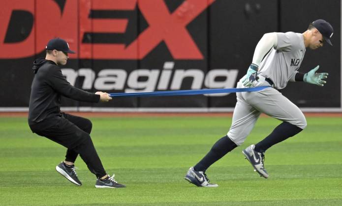 New York Yankees outfielder Aaron Judge loosens up before a baseball game against the Tampa Bay Rays at Tropicana Field in St. Petersburg, Florida on Saturday, May 11, 2024.  FLSN20240511102 STEVExNESIUS