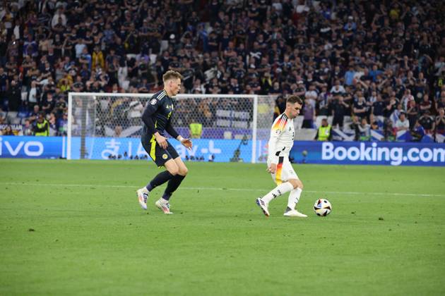 14.06.2024, Fussball, Herren, UEFA Europameisterschaft 2024, Eröffnungsspiel, Gruppe A, Deutschland - Schottland, Pascal Groß (Deutschland), Scott McTominay (Schottland) München Allianz Arena Bayern Deutschland (DE) Copyright: xSebastianxBachx