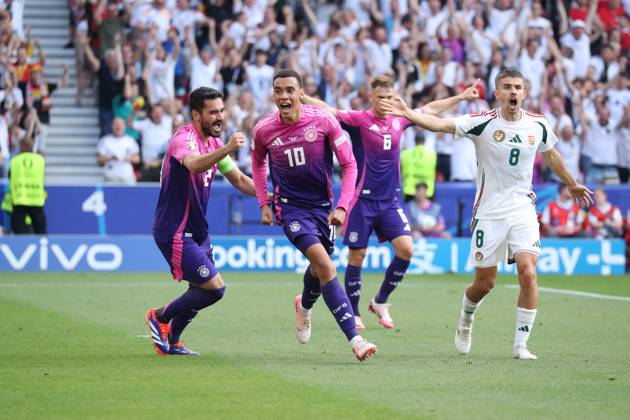 Germany - UEFA EURO, EM, Europameisterschaft,Fussball 2024 - Germany vs Hungary - 19 06 2024 GERMANY, STUTTGART, JUNE 19. Jamal Musiala of Germany celebrates after scoring a goal while Adam Nagy of Hungary (R) protests during the UEFA EURO 2024 group A stage match between Germany and Hungary. On June 19, 2024 at Stuttgart Arena in Stuttgart, Germany. Photo by Manuel Blondeau AOP.Press Stuttgart Stuttgart Arena Germany Copyright: x ManuelxBlondeau AOP.Pressx AOP20240619 0001