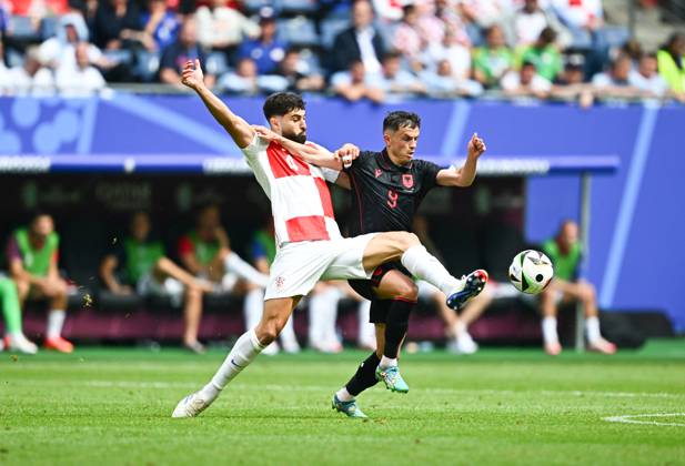 UEFA European Football Championship - UEFA EURO, EM, Europameisterschaft,Fussball 2024 - Croatia vs Albania Josko Gvardiol of Croatia and Jasir Asani of Albania during the EURO 2024, Group B football match between Albania and Croatia on 19 June 2024 at Volksparkstadion Hamburg, Germany. Photo Nderim Kaceli Hamburg Germany Copyright: xIPAxSport ABACAx