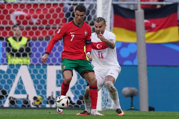 2024-06-22 Turkiye v Portugal - Group F - UEFA EURO, EM, Europameisterschaft,Fussball 2024 DORTMUND, GERMANY - JUNE 22: Cristiano Ronaldo of Portugal with Abdulkerim Bardakci of Turkiye during the Group F - UEFA EURO 2024 match between Turkiye and Portugal at BVB Stadion Dortmund on June 22, 2024 in Dortmund, Germany. (Photo by Joris Verwijst BSR Agency) Dortmund Germany Content not available for redistribution in The Netherlands directly or indirectly through any third parties. Copyright: xBSRxAgencyx