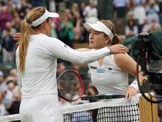 Lawn Tennis - 2024 Wimbledon Championship Lulu Sun (NZL) v Donna Vekic (CRO) All England Lawn Tennis & Croquet Club - Tuesday 9h July 2024 Donna Vekic (CRO) and Lulu Sun at the net after the match