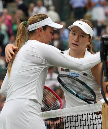 Lawn Tennis - 2024 Wimbledon Championship Lulu Sun (NZL) v Donna Vekic (CRO) All England Lawn Tennis & Croquet Club - Tuesday 9h July 2024 Donna Vekic (CRO) and Lulu Sun at the net after the match