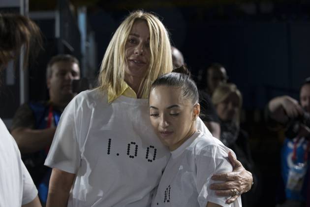 Artistic Gymnastics World Championships OCT 1 October 1, 2017: Gymnast Larisa Iordache (ROU) at podium training with legendary Romanian gymnast Nadia Comaneci, during the 47th FIG Artistic Gymnastics World Championships in Montreal, Canada. Both are seen wearing t-shirts that commemorate Comaneci scoring the first perfect 10.0 in Olympic history, at the 1976 Montreal games. Iordache suffered an achilles tear just before the start of competition and had to withdraw. Melissa J. Perenson CSM Montreal California Canada EDITORIAL USE ONLY Copyright: xx ZUMA-20171001_zaf_c04_318.jpg MelissaxJ.xPerensonx csmphototwo295103