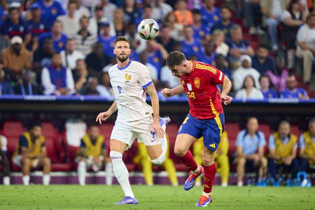 Olivier GIROUD, FRA 9 compete for the ball, tackling, duel, header, zweikampf, action, fight against Aymeric Laporte, ESP 14 in the semi final match SPAIN - FRANCE 2-1 of the UEFA European Championships 2024 on Jul 9, 2024 in Munich, Germany.