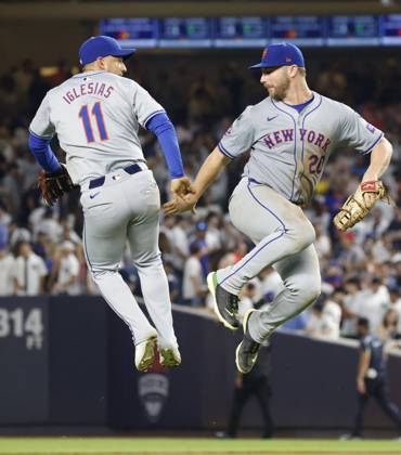 New York Mets Pete Alonso and Jose Iglesias celebrate after the game against the New York Yankees at Yankee Stadium on Tuesday, July 23, 2024 in New York City. The Mets defeated the Yankees 3-2.  NYP20240723122 JOHNxANGELILLO