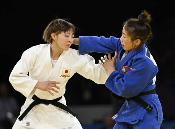 Paris Olympics: Judo Japan s Natsumi Tsunoda (white) competes in the women s judo 48-kilogram final against Baasankhuu Bavuudorj of Mongolia at the Paris Olympics at Champ de Mars Arena in Paris on July 27, 2024.  A14AA0003190591P
