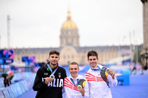 Italian silver medallist Filippo Ganna, Belgian gold medallist Remco Evenepoel and Belgian bronze medallist Wout van Aert pictured during the podium ceremony of the men s time trial event at the Paris 2024 Olympic Games, Olympische Spiele, Olympia, OS on Saturday 27 July 2024 in Paris, France . The Games of the XXXIII Olympiad are taking place in Paris from 26 July to 11 August. The Belgian delegation counts 165 athletes in 21 sports. LAURIExDIEFFEMBACQ  x97170986x