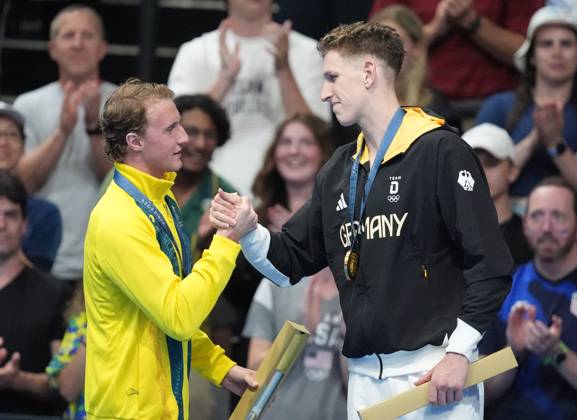 Gold medalist Lukas Maertens of Germany (R) is congratulated by silver medalist Elijah Winnington of Australia after the Men s 400m Freestyle Finals at the Paris 2024 Olympic Games, Olympische Spiele, Olympia, OS at La Defense Arena in Paris, France on Saturday, July 27, 2024. Maertens won the gold medal, Elijah Winnington of Australia won the silver and Woomin Kim of South Korea won the bronze.  OLY202407271580 RICHARDxELLIS