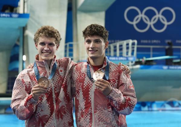 July 29, 2024, Paris, FRANCE: Canada s Nathan Zsombor-Murray, right, and Rylan Wiens reacts after winning the bronze medal in Men s Synchronized 10m Platform Diving at the Paris Summer Olympics in Paris, France on Monday, July 29, 2024. Canada News - July 29, 2024  - ZUMAc35_ 20240729_zaf_c35_046 Copyright: xNathanxDenettex