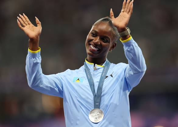 (240807) -- PARIS, Aug. 7, 2024 -- Silver medalist Julien Alfred of Saint Lucia reacts during the victory ceremony of the women s 200m of Athletics at the Paris 2024 Olympic Games, Olympische Spiele, Olympia, OS in Paris, France, Aug. 7, 2024. ) (PARIS2024) FRANCE-PARIS-OLY-ATHLETICS-200M-WOMEN LixGang 