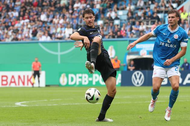 18.08.2024, xtgx, Fussball DFB Pokal 1. Runde, FC Hansa Rostock - Hertha BSC Berlin emspor, v.l. Linus Gechter (Hertha, 44), Alexander Rossipal (Rostock, 21) Zweikampf, Duell, Kampf, tackle (DFL DFB REGULATIONS PROHIBIT ANY USE OF PHOTOGRAPHS as IMAGE SEQUENCES and or QUASI-VIDEO) Rostock