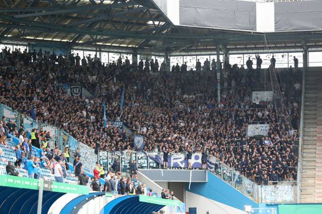 18.08.2024, xtgx, Fussball DFB Pokal 1. Runde, FC Hansa Rostock - Hertha BSC Berlin emspor, v.l. Hertha Fans Symbolfoto, Symbolbild, Symbol Fans, Zuschauer, Publikum, Tribuene (DFL DFB REGULATIONS PROHIBIT ANY USE OF PHOTOGRAPHS as IMAGE SEQUENCES and or QUASI-VIDEO) Rostock
