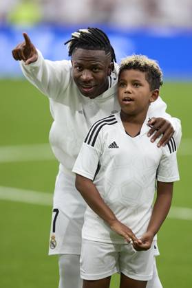 August 25, 2024, Madrid, Madrid, Spain: Kim Kardashian son with Vinicius Jr of Real Madrid CF during La Liga football match between Real Madrid CF v Real Valladolid at Santiago Bernabeu Stadium in Madrid, Spain, August 25, 2024 Madrid Spain - ZUMAa206 20240825_zsp_a206_057 Copyright: xRubenxAlbarranx