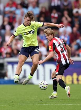 London, England, 31st August 2024. Brentford s Mads Roerslev with Southampton s Tyler Dibling during the Premier League match at Gtech Community Stadium, London. Picture credit should read: David Klein Sportimage EDITORIAL USE ONLY. No use with unauthorised audio, video, data, fixture lists, club league logos or live services. Online in-match use limited to 120 images, no video emulation. No use in betting, games or single club league player publications. SPI-3288-0069