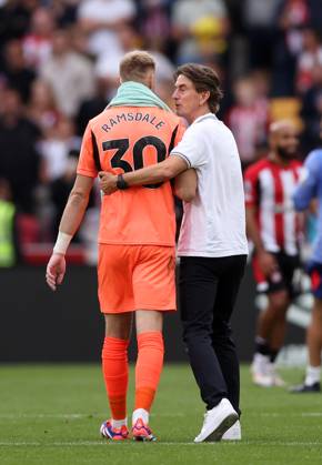 London, England, 31st August 2024. Brentford s head coach Thomas Frank with Southampton s goalkeeper Aaron Ramsdale during the Premier League match at Gtech Community Stadium, London. Picture credit should read: David Klein Sportimage EDITORIAL USE ONLY. No use with unauthorised audio, video, data, fixture lists, club league logos or live services. Online in-match use limited to 120 images, no video emulation. No use in betting, games or single club league player publications. SPI-3288-0081