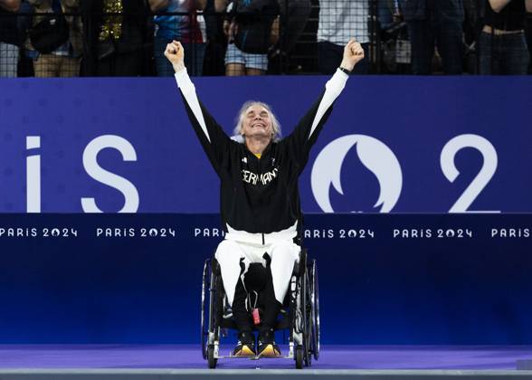 PARIS, FRANCE - SEPTEMBER 02: Thomas WANDSCHNEIDER (GER), startclass WH1 wins the bronce medal and celebrates during the winning ceremony Paris 2024 Summer Paralympic Games at Porte de la Chapelle Arena on September 02, 2024 in Paris, France. (Photo by Mika Volkmann DBS)