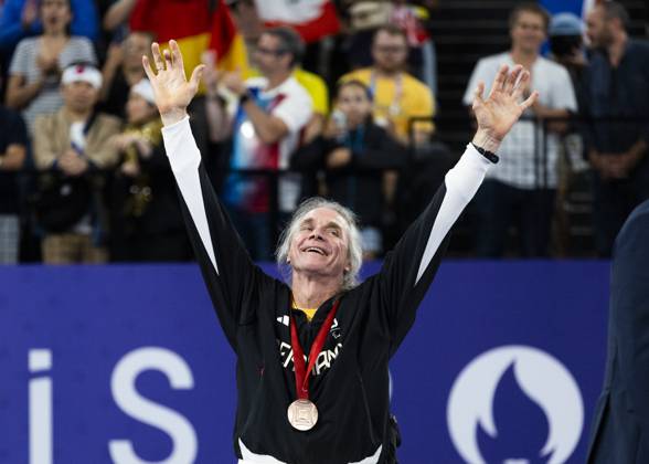 PARIS, FRANCE - SEPTEMBER 02: Thomas WANDSCHNEIDER (GER), startclass WH1 wins the bronce medal and celebrates during the winning ceremony Paris 2024 Summer Paralympic Games at Porte de la Chapelle Arena on September 02, 2024 in Paris, France. (Photo by Mika Volkmann DBS)