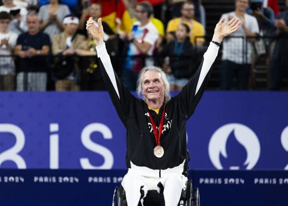 PARIS, FRANCE - SEPTEMBER 02: Thomas WANDSCHNEIDER (GER), startclass WH1 wins the bronce medal and celebrates during the winning ceremony Paris 2024 Summer Paralympic Games at Porte de la Chapelle Arena on September 02, 2024 in Paris, France. (Photo by Mika Volkmann DBS)