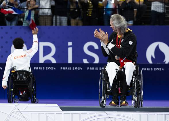 PARIS, FRANCE - SEPTEMBER 02: Thomas WANDSCHNEIDER (GER), startclass WH1 wins the bronce medal and celebrates during the winning ceremony Paris 2024 Summer Paralympic Games at Porte de la Chapelle Arena on September 02, 2024 in Paris, France. (Photo by Mika Volkmann DBS)