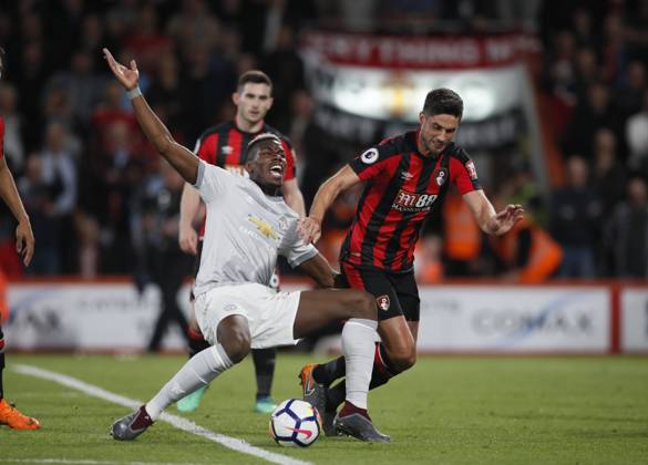 AFC Bournemouth v Manchester United, ManU - Premier League - Vitality Stadium April 18, 2018 - Bournemouth, United Kingdom - Paul Pogba of Manchester United goes down under a tackle by Andrew Surman of Bournemouth during the premier league match at the Vitality Stadium, Bournemouth. Picture date 18th April 2018. Picture credit should read: David Klein Sportimage Bournemouth United Kingdom EDITORIAL USE ONLY Copyright: xx ZUMA-20180418_zaf_si1_058.jpg DavidxKleinx csmphototwo392139