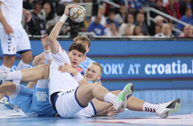 HC Zagreb v Aalborg Handbold - EHF Champions League ZAGREB, CROATIA - SEPTEMBER 18: Luka Lovre Klarica of HC Zagreb is challenged by Felix Moller of Aalborg Handbold and Thomas Arnoldsen of Aalborg Handbold during EHF Champions League Group Phase match between HC Zagreb and Aalborg Handbold at Arena Zagreb on September 18, 2024 in Zagreb, Croatia. SanjinxStrukic PIXSELL