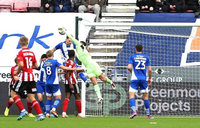 Wigan Athletic v Exeter City EFL Sky Bet League 1 28 09 2024. Wigan Athletic goalkeeper Sam Tickle (1) tips a corner around the post during the EFL Sky Bet League 1 match between Wigan Athletic and Exeter City at the Brick Community Stadium, Wigan, England on 28 September 2024. Wigan Brick Community Stadium Greater Manchester England Editorial use only DataCo restrictions apply See www.football-dataco.com , Copyright: xJohnxBradleyx PSI-20514-0028