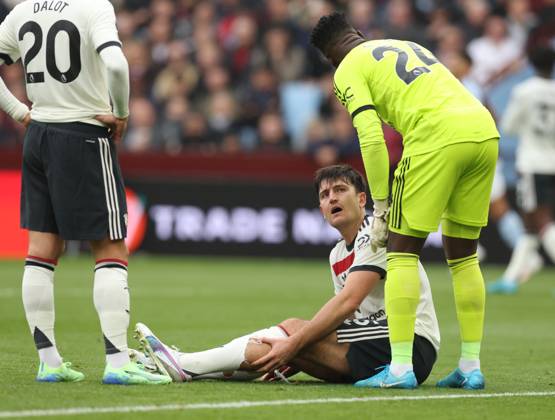Football - 2024 2025 Premier League - Aston Villa vs Manchester United, ManU - Villa Park - Sunday 6th October 2024 Harry Maguire of Manchester United lies injured and looks dejected