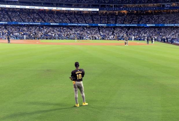 October 6, 2024, Los Angeles, California, United States: Los Angles, October 6 2024..Padres left fielder Jurickson Profar in the left field as fans continue to derision from the bleachers in game two of the National League Division Series at Dodger Stadium San Diego Padres won the game10-2. Los Angeles USA - ZUMAa60_ 20241006_zaf_a60_060 Copyright: xArmandoxArorizox