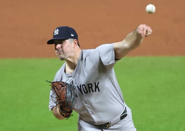 New York Yankees starting pitcher Carlos Rodon throws against the Cleveland Guardians in the first inning in game five of the MLB, Baseball Herren, USA ALCS at Progressive Field in Cleveland, Ohio, on Saturday, October 19, 2024.  CLE20241019801 AARONxJOSEFCZYK