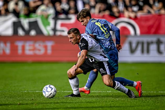 AFC Ajax Amsterdam forwarder Mika Godts, Heracles Almelo defender Damon Mirani, during the match Heracles Almelo - Ajax at the Asito stadium for the Dutch eredivisie season 2024-2025 in ALMELO, Netherlands on 20 oktober 2024, (photo by Stefan Koops EYE4images DeFodi Images) not used in POL SRB CRO FRA GBR NED ITA USA Defodi-746_196201