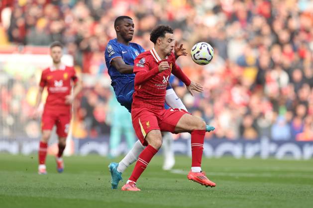 Football - 2024 2025 Premier League - Liverpool v Chelsea - Anfield - Sunday 20th October 2024 Curtis Jones of Liverpool and Moises Caicedo of Chelsea