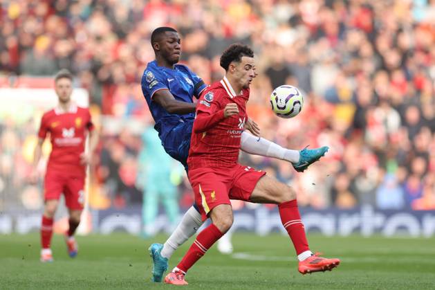 Football - 2024 2025 Premier League - Liverpool v Chelsea - Anfield - Sunday 20th October 2024 Curtis Jones of Liverpool and Moises Caicedo of Chelsea