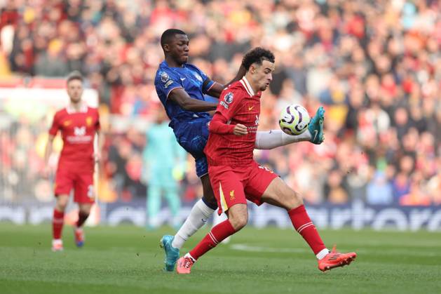 Football - 2024 2025 Premier League - Liverpool v Chelsea - Anfield - Sunday 20th October 2024 Curtis Jones of Liverpool and Moises Caicedo of Chelsea