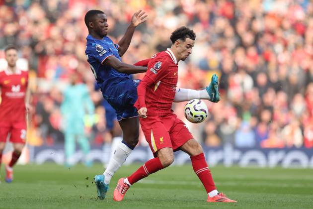 Football - 2024 2025 Premier League - Liverpool v Chelsea - Anfield - Sunday 20th October 2024 Curtis Jones of Liverpool and Moises Caicedo of Chelsea