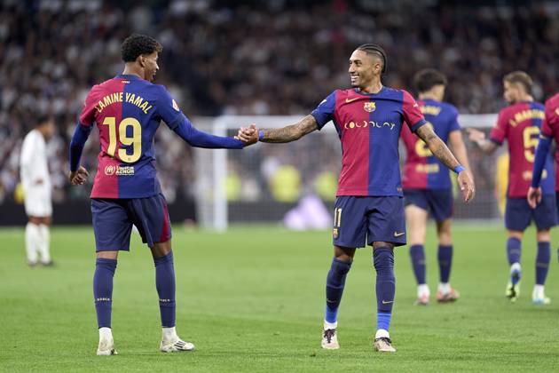 Lamine Yamal of FC Barcelona, Barca celebrates with Raphinha of FC Barcelona after scoring his team s third goal during the LaLiga EA Sports match between Real Madrid CF and FC Barcelona at Estadio Santiago Bernabeu on October 26, 2024 in Madrid, Spain. (Photo by: LGM Panoramic) FOOTBALL : Real Madrid CF vs FC Barcelona- LaLiga EA Sports - 26 10 2024 LGM Panoramic