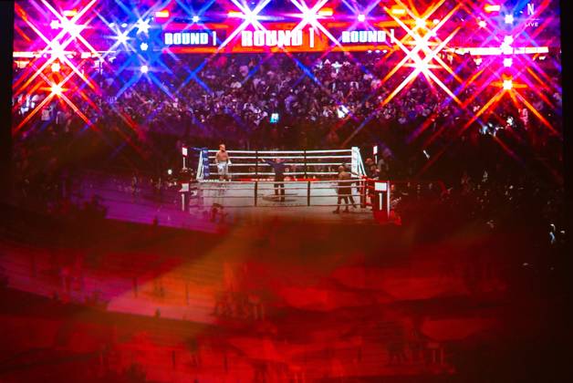 November 16, 2024, Manhattan, Kansas, USA: Reflections of the Paul, Tyson fight as viewed online presented by Netflix. Jake Paul wins the fight against Mike Tyson by unanimous decision after a full eight-round heavyweight match in AT&T Stadium in front of 70,000 fans on Friday. Hosted onine by Netflix with an estimated tens of millions of viewers. Manhattan USA - ZUMAt152 20241116_znp_t152_012 Copyright: xLukexTownsendx