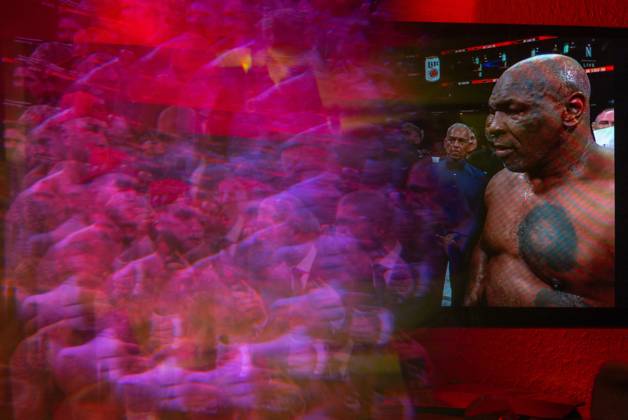November 16, 2024, Manhattan, Kansas, USA: Reflections of the Paul, Tyson fight as viewed online presented by Netflix. Jake Paul wins the fight against Mike Tyson by unanimous decision after a full eight-round heavyweight match in AT&T Stadium in front of 70,000 fans on Friday. Hosted onine by Netflix with an estimated tens of millions of viewers. Manhattan USA - ZUMAt152 20241116_znp_t152_027 Copyright: xLukexTownsendx
