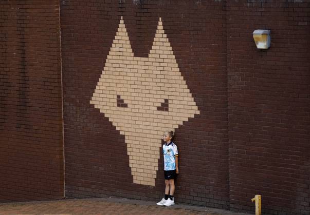 Wolverhampton Wanderers v Brentford - Premier League - Molineux September 18, 2021, Wolverhampton, United Kingdom: Wolverhampton, England, 18th September 2021. A young Wolverhampton Wanderers has his photograph taken before for the Premier League match at Molineux, Wolverhampton. Picture credit should read: Darren Staples Sportimage Wolverhampton United Kingdom EDITORIAL USE ONLY Copyright: xx ZUMA-20210918_zaf_si1_004.jpg DarrenxStaplesx csmphototwo790486