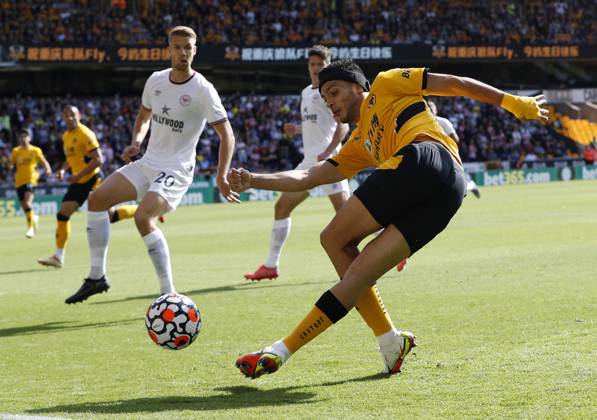 Wolverhampton Wanderers v Brentford - Premier League - Molineux September 18, 2021, Wolverhampton, United Kingdom: Wolverhampton, England, 18th September 2021. Raul Jimenez of Wolverhampton Wanderers crosses the ball during the Premier League match at Molineux, Wolverhampton. Picture credit should read: Darren Staples Sportimage Wolverhampton United Kingdom EDITORIAL USE ONLY Copyright: xx ZUMA-20210918_zaf_si1_013.jpg DarrenxStaplesx csmphototwo790498