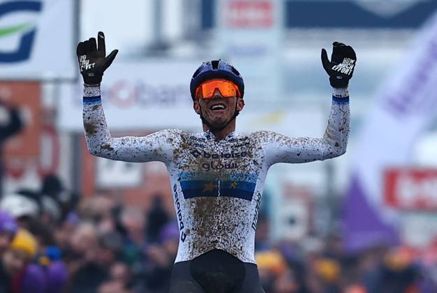 Belgian Thibau Nys celebrates as he crosses the finish line to win the elite men race of the Belgian Cyclocross Championships (11-12 01) on Sunday 12 January 2025 in Heusden-Zolder. DAVIDxPINTENS x110253343x