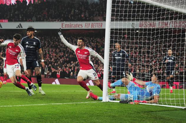 Football - 2024 2025 Premier League - Arsenal vs Aston Villa - Emirates Stadium - Saturday 18th January 2025 Gabriel Martinelli of Arsenal celebrates scoring his first half goal as Emiliano Martinez tries in vain to stop the ball crossing the line COLORSPORT Andrew Cowie