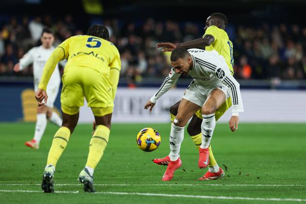 March 15, 2025, Villarreal, Castellon, SPAIN: Kylian Mbappe of Real Madrid and Pape Gueye of Villarreal in action during the Spanish league, LaLiga EA Sports, football match played between Villarreal CF and Real Madrid CF at La Ceramica stadium on March 15, 2025, in Villarreal, Spain. Villarreal SPAIN - ZUMAa181 20250315_zaa_a181_131 Copyright: xIrinaxR.xHipolitox