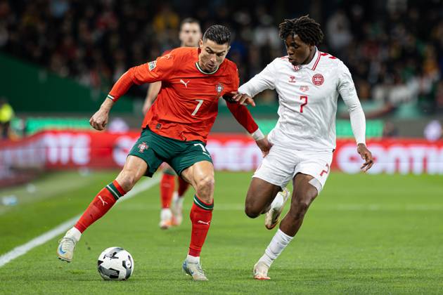 March 23, 2025, Lisbon, Portugal: Cristiano Ronaldo of Portugal and Patrick Dorgu of Denmark seen in action during the UEFA Nations League Quarterfinal Leg Two match between Portugal and Denmark at Estadio Jose Alvalade. Lisbon Portugal - ZUMAs197 20250323_aaa_s197_444 Copyright: xDavidxMartinsx